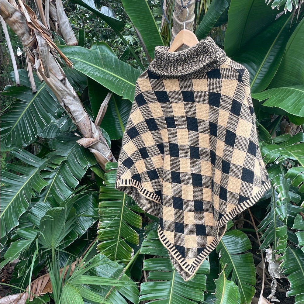 Made in Italy, plaid, metallic turtleneck, cape, or poncho
